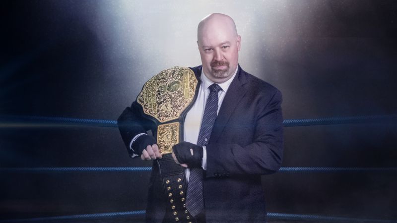 Kevin Sesock holding the belt